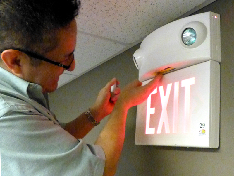 Fixing and testing emergency lights. 